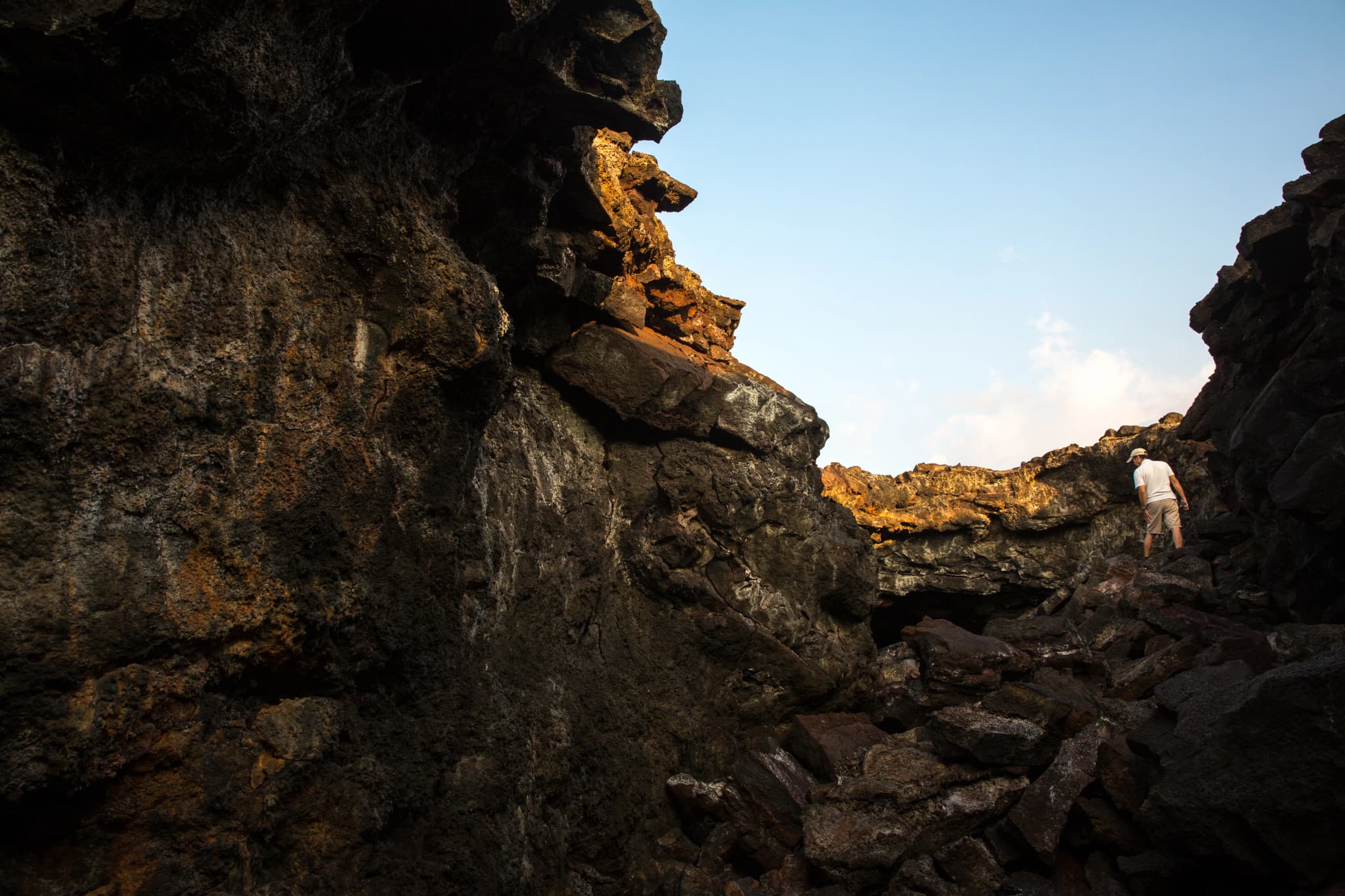 Man standing on a brown mountain range background